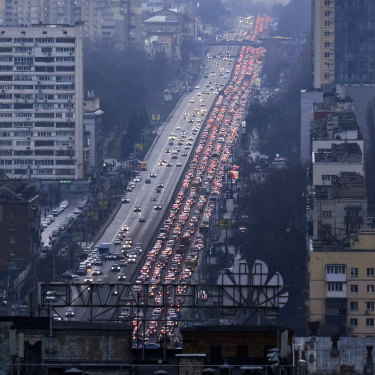 Cars stream out of Kyiv on February 24, following missile strikes by Russian forces on Ukrainian territory.
