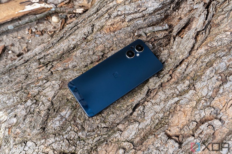 Angled view of OnePlus phone on a tree