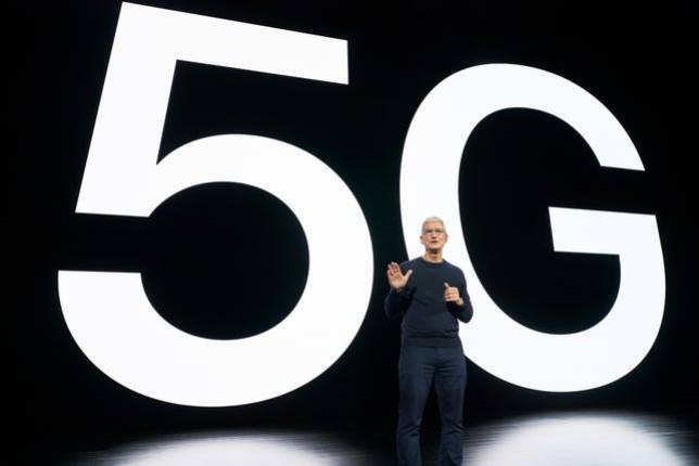 Tim Cook announcing Apple's first 5G iPhone