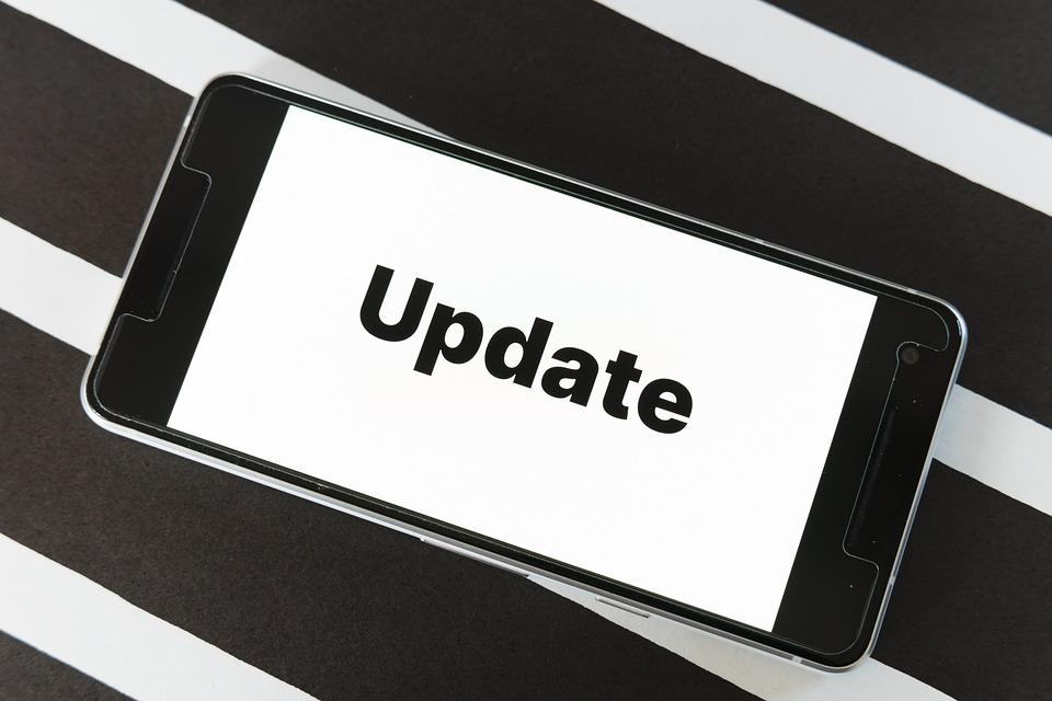 Image of a phone with the word "update" on the screen.
