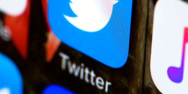 FILE - This April 26, 2017, file photo shows the Twitter app on a mobile phone in Philadelphia. (AP Photo/Matt Rourke, File)