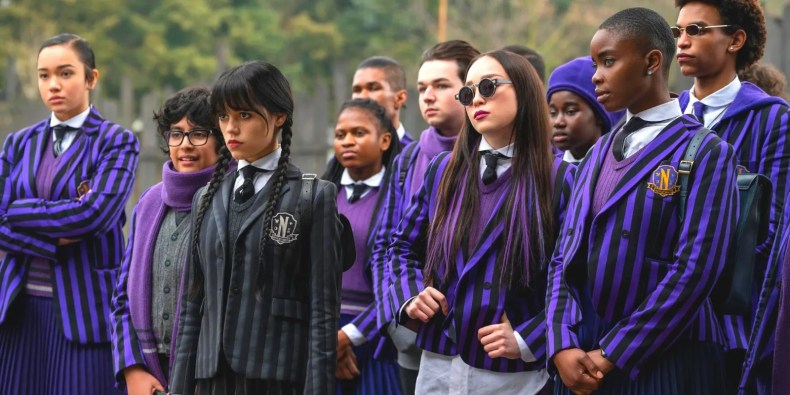 Wednesday Addams backed by her Nevermore peers