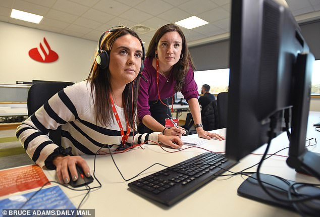 Safeguarding: Money Mail’s Jessica Beard (right) with Jade from Santander's Break the Spell team