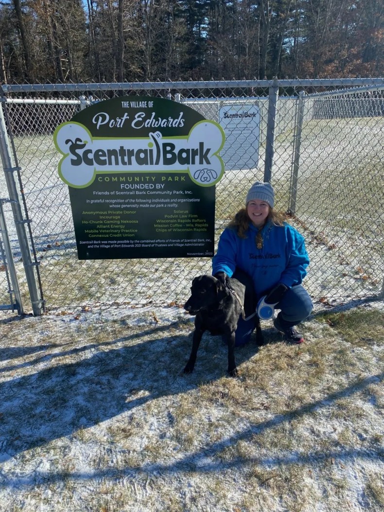 Wisconsin Rapids Daily Tribune Editor Jamie Rokus and her dog Sydney attend the opening of Scentrail Bark Community Park on Saturday, Dec. 3, 2022, in Port Edwards, Wisconsin. Rokus is a founding board member of Friends of Scentrail Bark Community Park Inc., which partnered with the Village of Port Edwards to create the dog park.