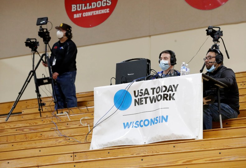 USA TODAY NETWORK-Wisconsin reporters broadcast a basketball game in De Pere.