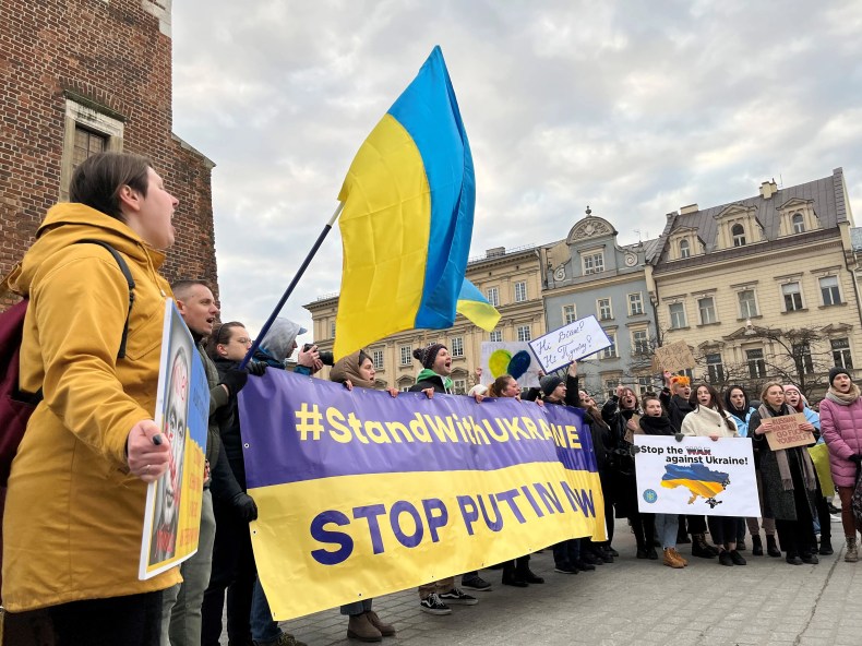 Hundreds gather in Krakow, Poland, to protest the Russian invasion of Ukraine.
