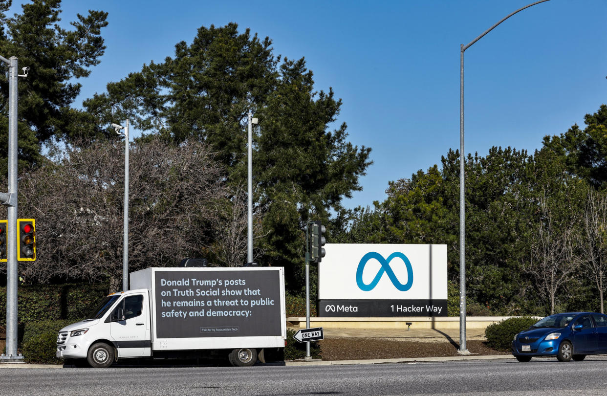 A mobile billboard, deployed by Accountable Tech, is seen outside the Meta headquarters in Menlo Park, Calif. (Kimberly White / Getty Images for Accountable Tech file)