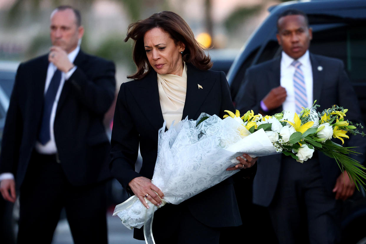 U.S. Vice President Kamala Harris walks to lay flowers at the memorial outside the Star Ballroom Dance Studio where a deadly mass shooting took place on January 25, 2023 in Monterey Park, California. Eleven people died and nine more were injured at the studio near a Lunar New Year celebration last Saturday night. Harris also was scheduled to meet with families of victims in the predominantly Asian American community of Monterey Park. (Mario Tama / Getty Images)