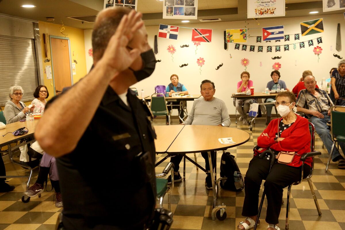 LAPD Senior Lead Officer Carlos Diaz was part of the presentation to help educate seniors of possible scams.