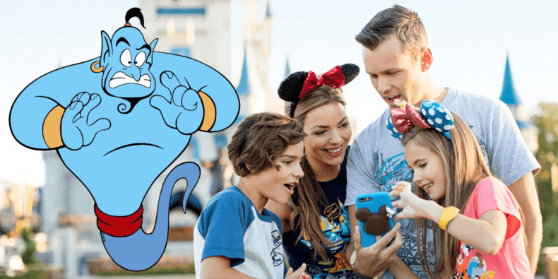 Guests use a phone at the Magic Kingdom next to the Genie