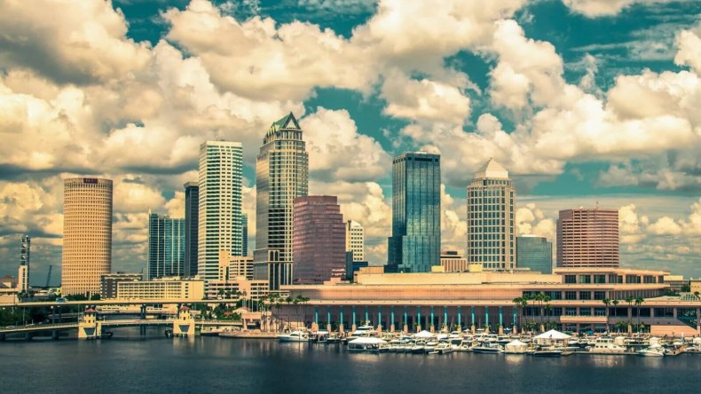 Vintage tone style image of Tampa Florida skyline under beautiful clouds