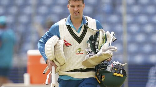Australia's Alex Carey carries cricket equipment during a nets session at Headingley, Leeds, England, Wednesday, July 5, 2023. (Martin Rickett/PA via AP)