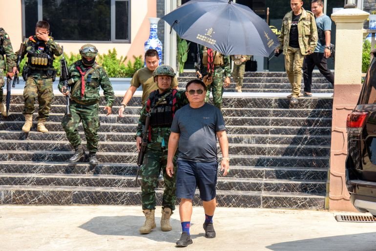 Myanmar warlord Saw Chit Thu leaves after an interview with local media at Shwe Kokko city, a casino, entertainment and tourism complex in Myawaddy, Myanmar, February 18, 2025. REUTERS/Stringer