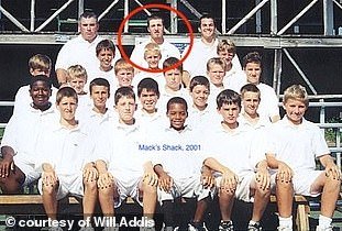 Addis stands directly in front of his alleged abuser Matt Scavitto, who he says groomed him during summers at Camp Tecumseh