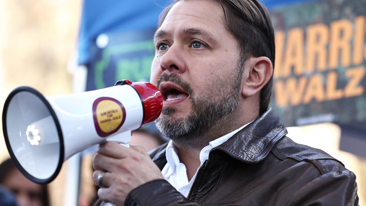 Rep. Ruben Gallego speaking into a blowborn