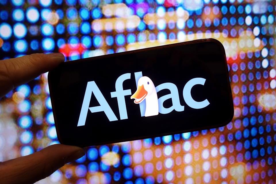 SOPA Images/LightRocket via Getty Images - PHOTO: The Aflac company logo is seen displayed on a smartphone screen.