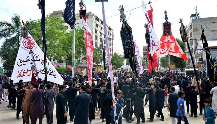 A large numbers of mourners attending Ashura procession on 9th Muharramul Haram in Latifabad, Hyderabad, on July 28, 2023. — APP