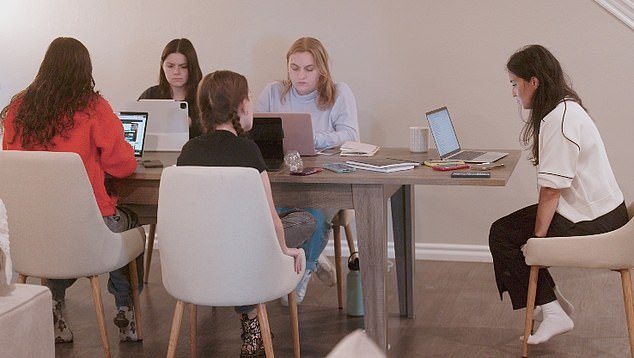 Ariel seen in her computer working hard with SOSA team members