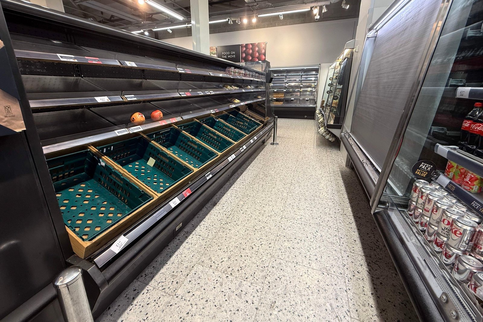 Empty shelves in a Marks and Spencer food store due to a hacking outage.