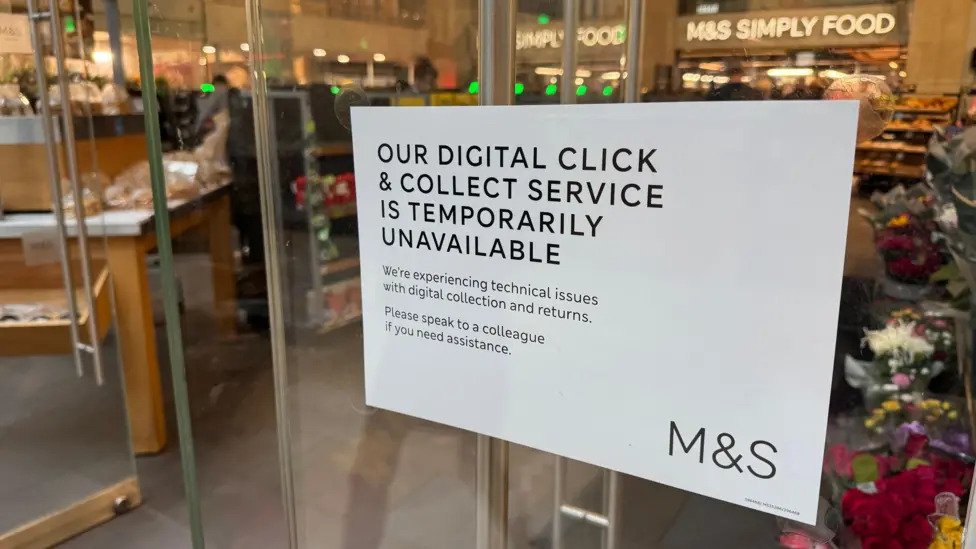 M&S store sign: click and collect service temporarily unavailable due to technical issues.