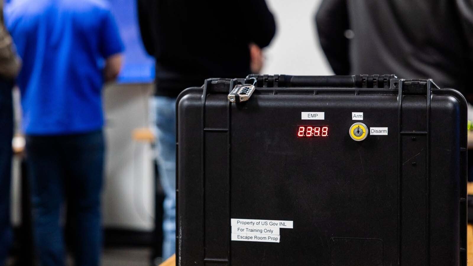 One of the digital escape room scenarios uses a briefcase with a timer.