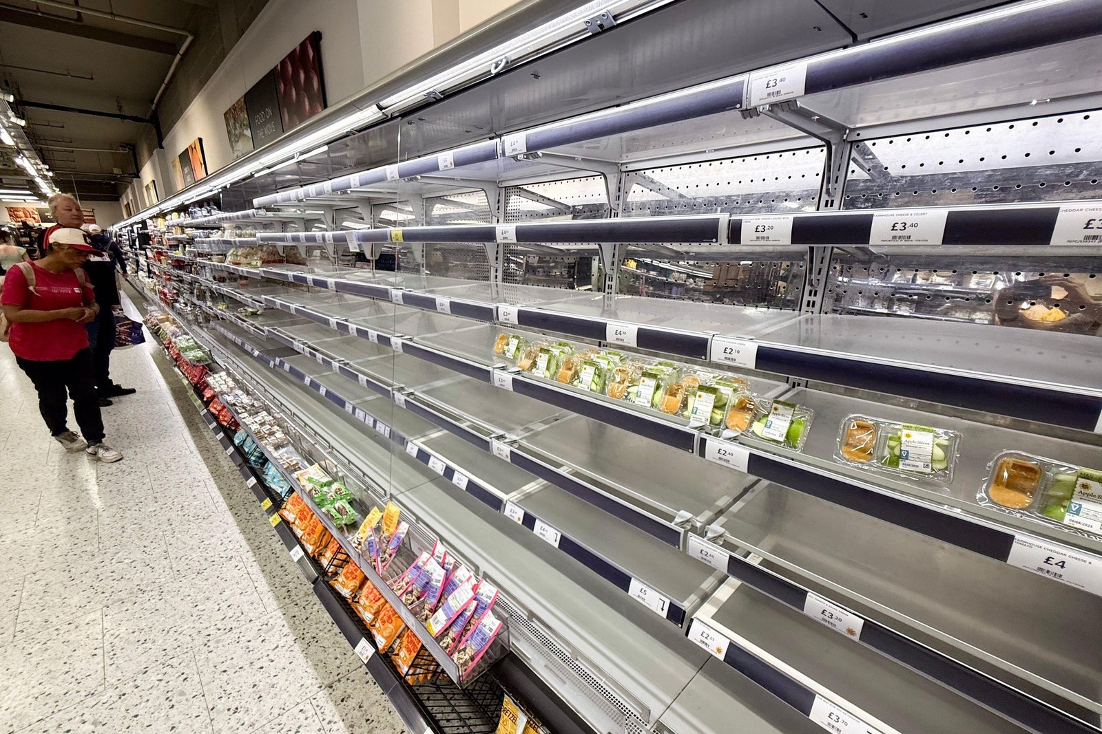Empty shelves in a Marks & Spencer food store due to a hacking outage.