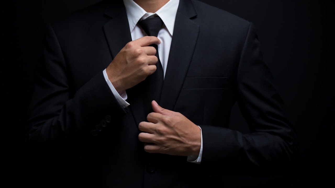 1280×720-black-suit-tie.jpeg