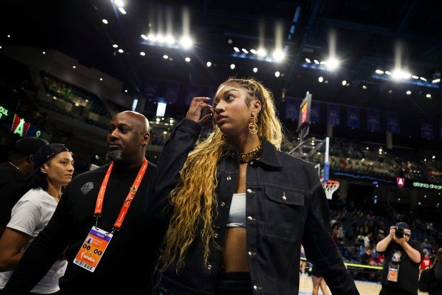 Sky forward Angel Reese walks off the court after an 86-49 loss to the Dream on July 16, 2025, at Wintrust Arena. Reese sat out with a leg injury. (Eileen T. Meslar/Chicago Tribune)