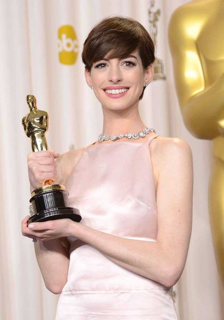 HOLLYWOOD, CA - FEBRUARY 24:  Actress Anne Hathaway, winner of the Best Supporting Actress award for "Les Miserables," poses in the press room during the Oscars held at Loews Hollywood Hotel on February 24, 2013 in Hollywood, California.  (Photo by Jason Merritt/Getty Images)