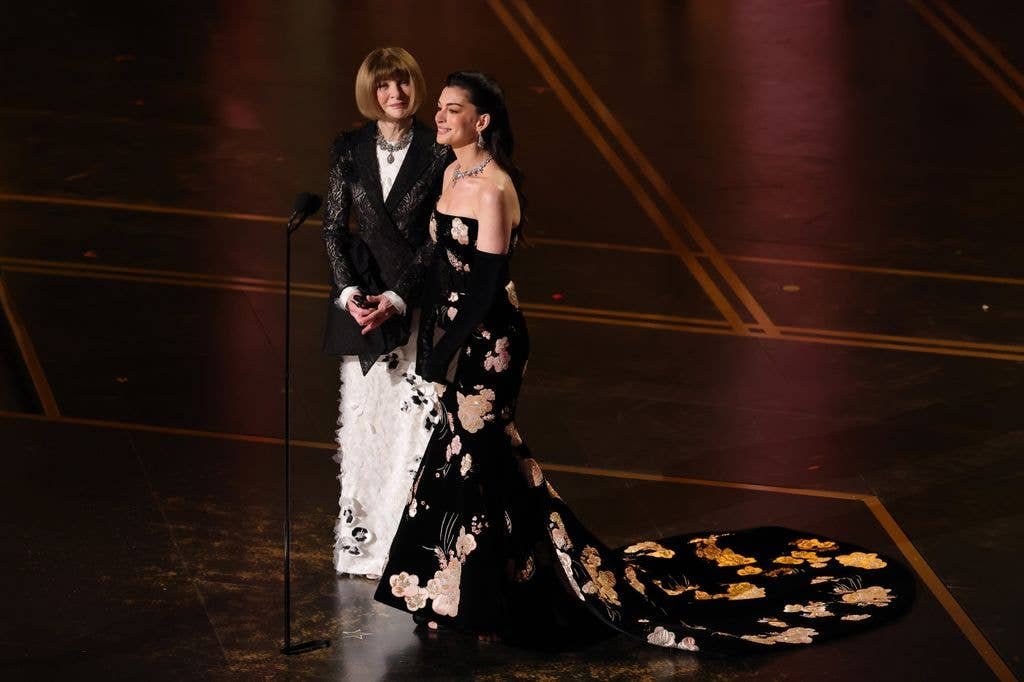 Anna Wintour and Anne Hathaway speak onstage during the 98th Oscars at Dolby Theatre on March 15, 2026 in Hollywood, California